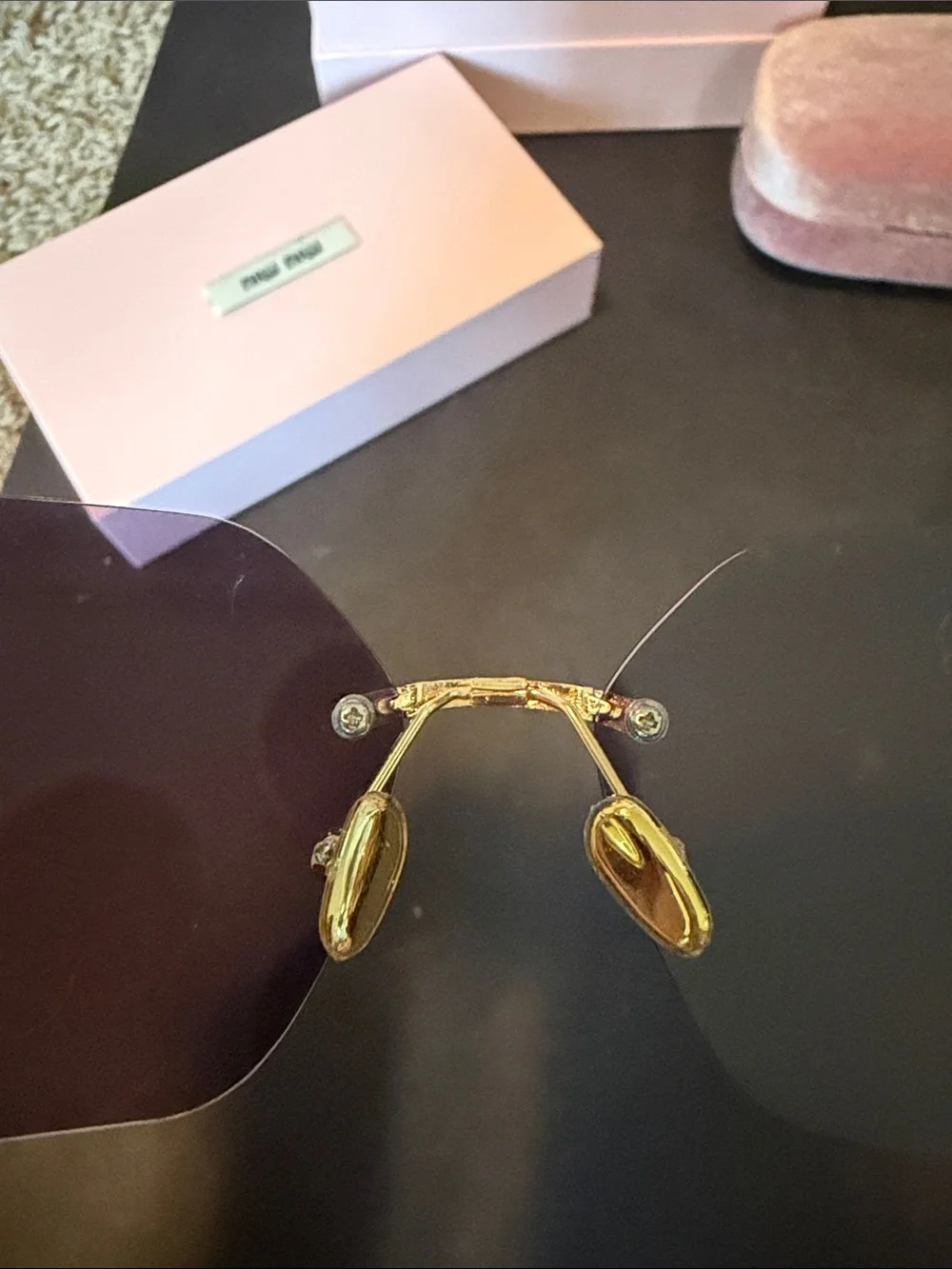Miu Miu Rimless Sunglasses with Purple Gradient Lenses and Gold Accents